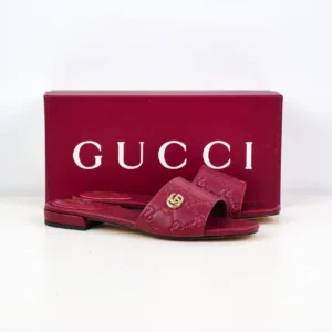 Gucci GG Slide Sandal red leather embossed floral pattern with gold interlocking G hardware flat slippers