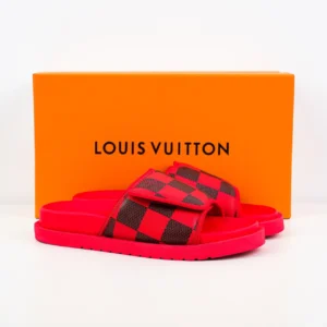 Louis Vuitton Miami Damier Round Head One Word Slippers in red and black checkered pattern, displayed beside an orange Louis Vuitton box.