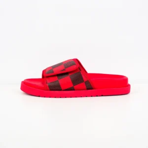 Louis Vuitton Miami Damier Round Head One Word Slippers in red and black checkerboard pattern, featuring a comfortable slip-on design, displayed on a white background.