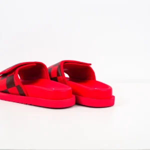 Red Louis Vuitton Miami Damier Round Head One Word Slippers with contrasting black accents, showcasing a stylish and modern design.