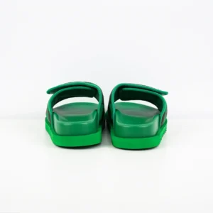 Green LV Miami Damier Round Head One Word Slippers viewed from the back, highlighting the unique design and color.