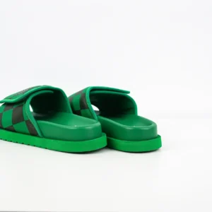LV Miami Damier Round Head One Word Slippers in vibrant green with black checkered design, showcasing luxury style and comfort.