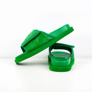 Green LV Miami Damier Round Head One Word Slippers showcasing luxury design and embossed logo, featured in the context of affordable replica footwear.