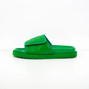 LV Miami Damier Round Head One Word Slippers in vibrant green, showcasing a sleek design and luxury branding, featured as affordable replica footwear.