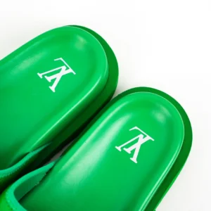 Green LV Miami Damier Round Head One Word Slippers featuring Louis Vuitton logo on the footbed, showcasing a luxury replica design.