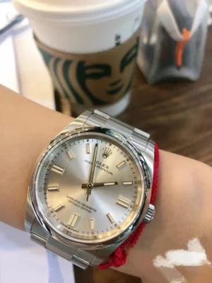 Rolex Oyster Perpetual silver dial stainless steel bezel stainless steel watch