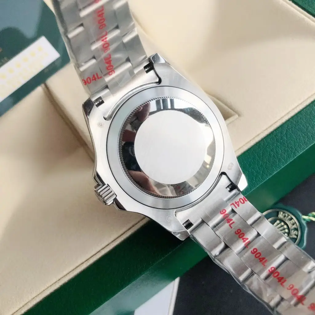 Rolex Submariner stainless steel watch case back with 904L steel bracelet in protective film wrap