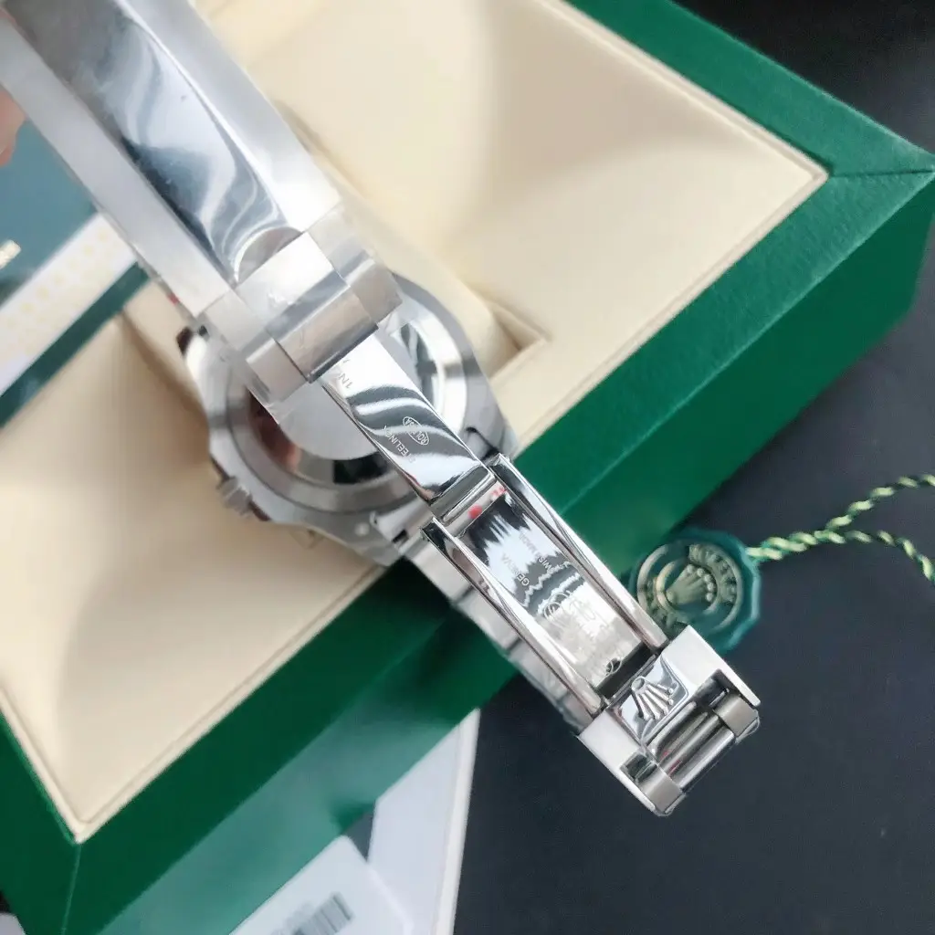 Rolex Submariner 116610LN stainless steel bracelet with clasp and genuine markings inside green Rolex box