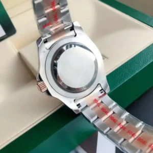 Rolex Submariner 116610LN stainless steel case two-tone bracelet with rose gold crown and protective plastic wrap