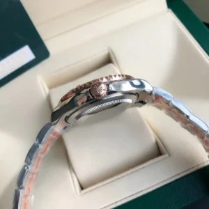 Rolex Submariner 126613LN black dial rose gold bezel stainless steel watch side view in box