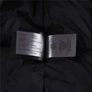 Label showing natural blue fox fur origin from Finland and manufacturer Moose International Canada on black fabric background