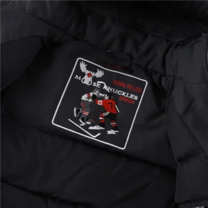 Moose Knuckles down-filled jacket black fabric embroidered hockey patch design