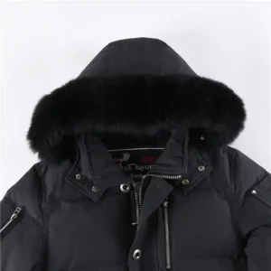 Moose Knuckles Men’s Original 3Q Shearling Trim Down Jacket featuring a black exterior, fur-trimmed hood, and zipper details, designed for extreme cold weather.