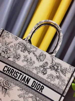 Christian Dior Book Tote medium beige floral canvas handbag with black logo detailing and top handles