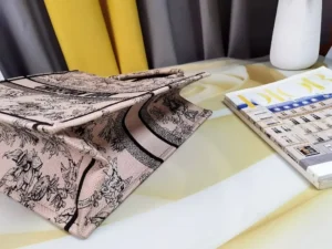 Christian Dior Book Tote medium pink canvas bag with black floral print and logo design