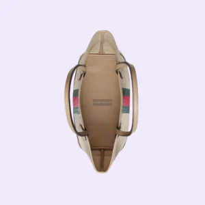 Top view of Gucci Ophidia small handbag featuring beige and ebony GG Supreme canvas, red and green striped webbing, and leather handles, showcasing the interior design and craftsmanship.