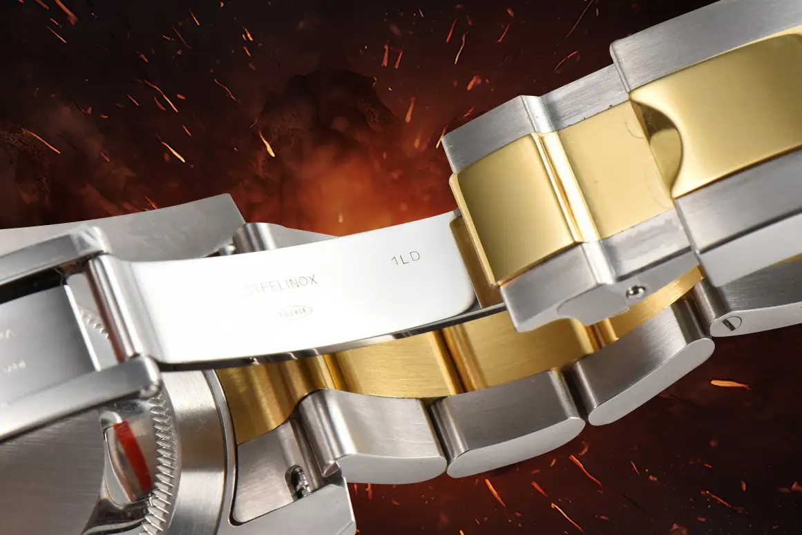 Rolex Submariner 116613LN black dial ceramic bezel stainless steel and yellow gold watch bracelet close-up