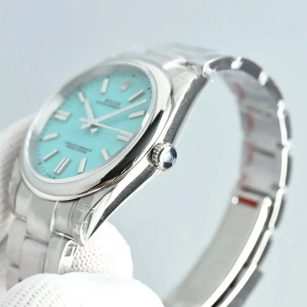 Rolex Oyster Perpetual 124300 turquoise dial stainless steel bezel stainless steel watch