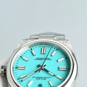 Rolex Oyster Perpetual 124300 turquoise dial stainless steel watch with smooth bezel and Oyster bracelet