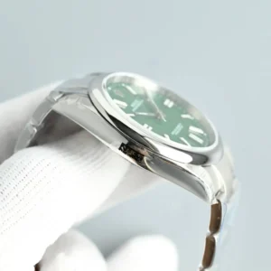 Rolex Oyster Perpetual 124300 green dial smooth bezel stainless steel watch