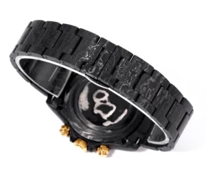 Rolex Daytona black dial forged carbon case and bracelet watch with gold chronograph pushers