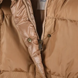 Moncler hooded short down jacket featuring a zippered front and soft, warm fabric in a stylish beige color.
