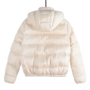 Moncler Alliance: Gisor women's quilted hooded short down jacket in cream color, displayed from the back, showcasing its plush texture and elasticated hem.