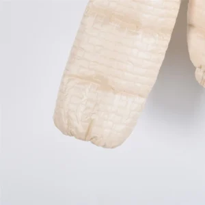 Moncler Alliance: Gisor women's quilted hooded short down jacket sleeve detail in cream color.