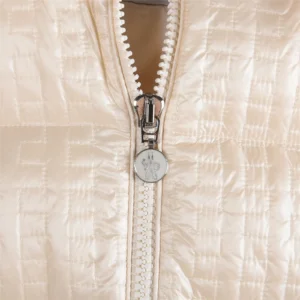 Close-up of Moncler Alliance: Gisor women's quilted short down jacket featuring a silver zipper and logo detail.