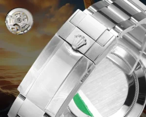 Rolex Oyster Perpetual silver stainless steel watch bracelet clasp with engraved logo and movement mechanism detail
