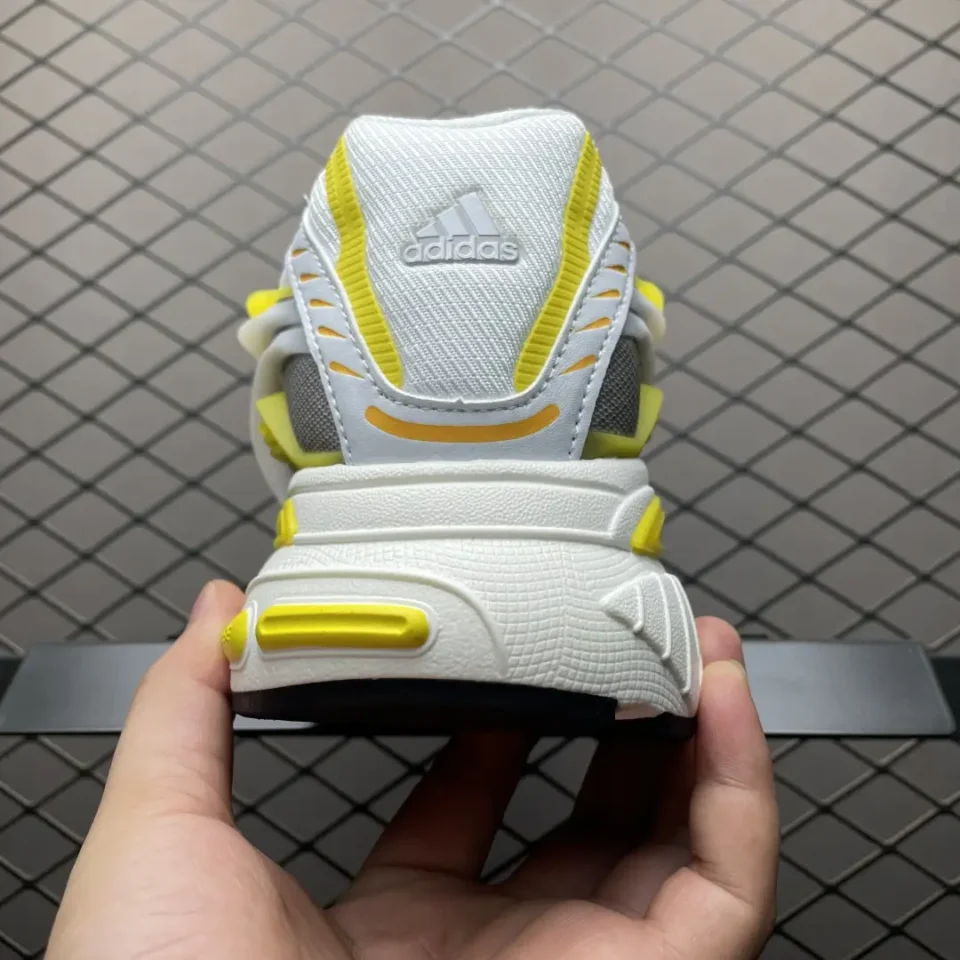Adidas Temper Run white yellow gray mesh leather sneakers with textured sole and logo detail