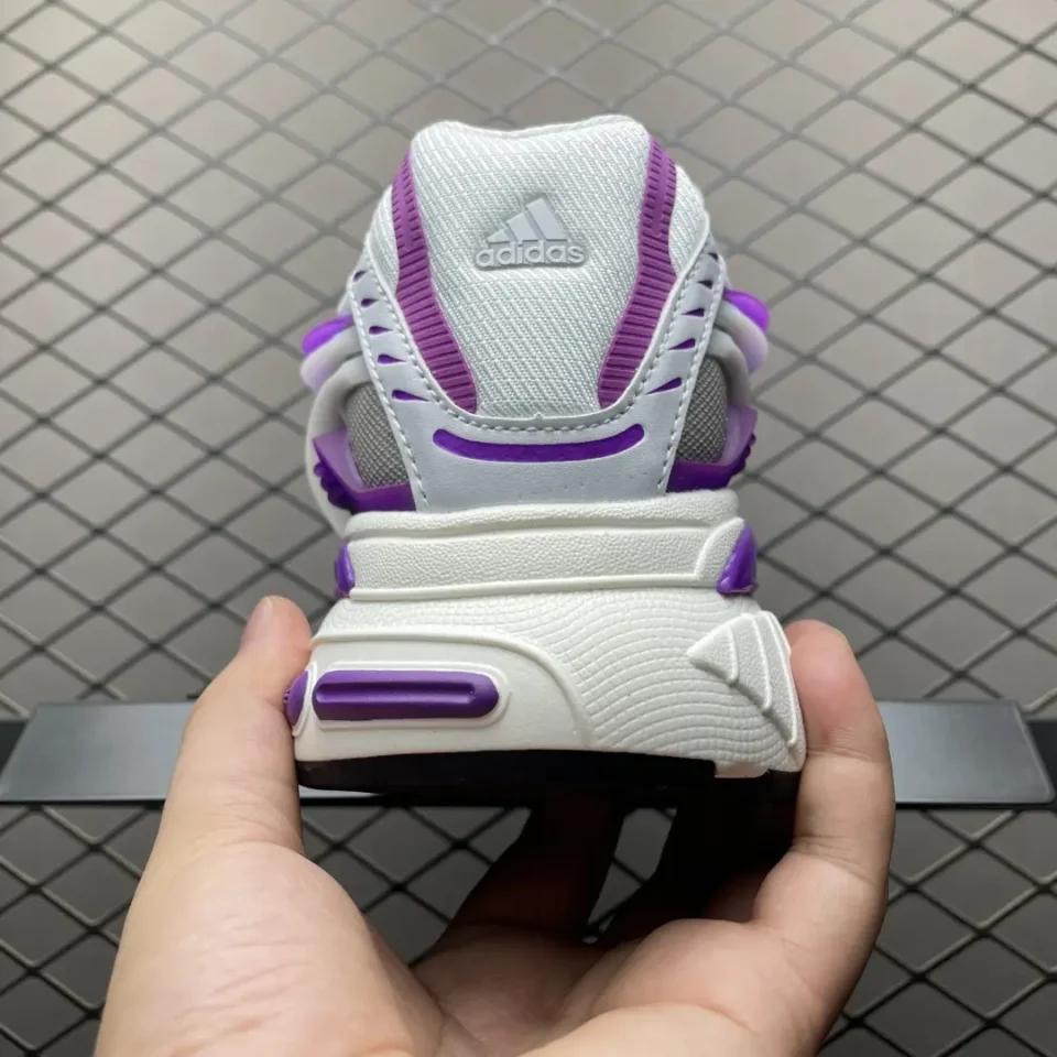 Adidas sneaker white purple grey mesh leather sneakers rear view held in hand