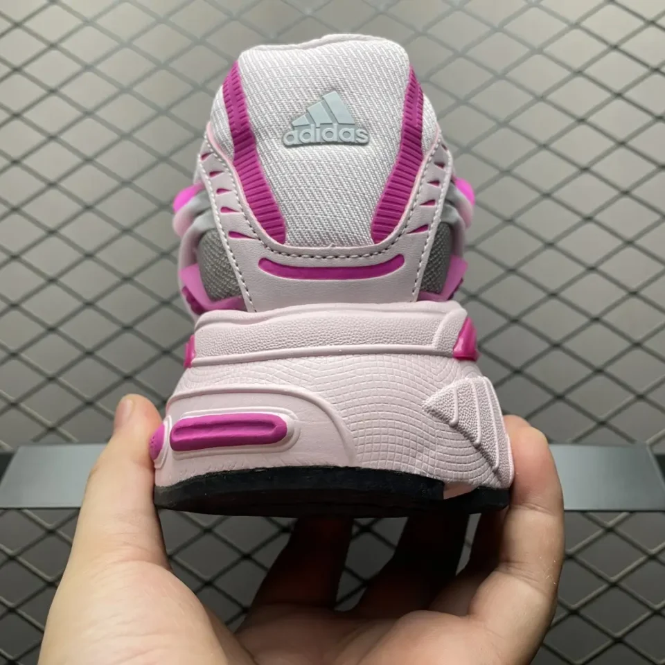 Adidas LXCON pink purple white leather mesh sneakers rear view held in hand