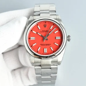 Rolex watch with vibrant coral dial