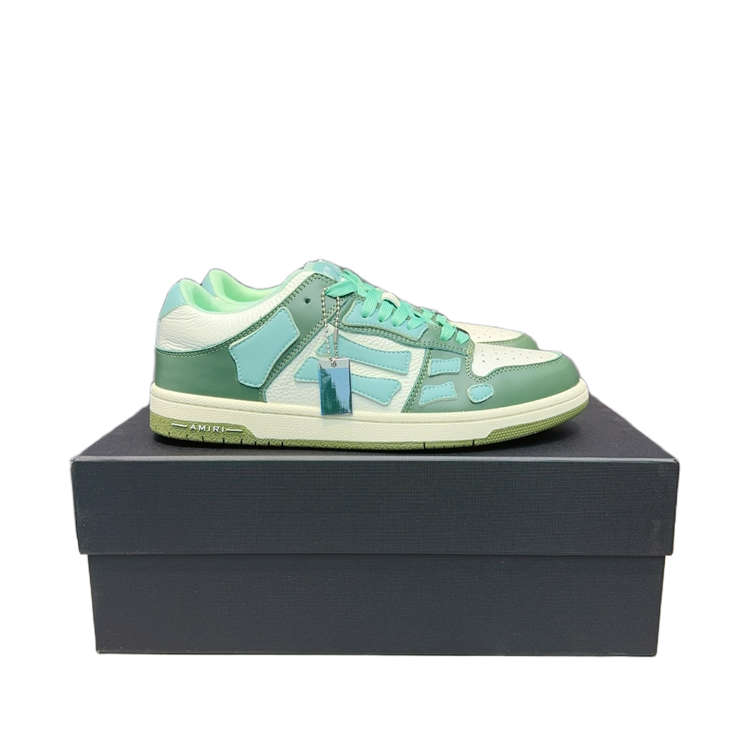 Amiri Skel Top Low 4 green white leather sneakers with layered panel detailing on black shoebox
