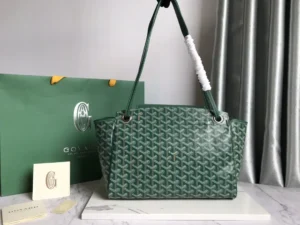 Goyard Rouette bag in green, showcasing intricate woven design, accompanied by Goyard packaging, emphasizing luxury and versatility in accessories.