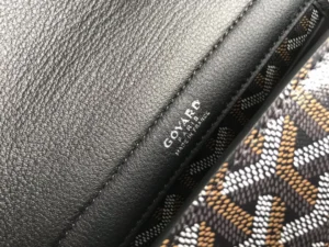 Goyard logo on the interior of the Rouette bag, showcasing high-quality leather and distinctive patterned fabric.