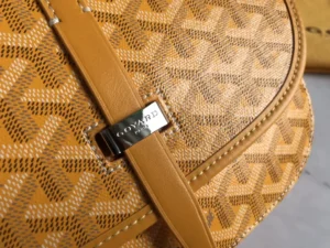 Goyard Belv é d è re Single Mailman Bag featuring signature pattern and leather strap with logo detail, showcasing elegant design and craftsmanship.