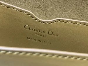 Interior label of the Dior Bobby East-West Bag featuring "Christian Dior Paris Made in Italy" inscription, highlighting luxury craftsmanship.