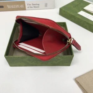 Gucci zip pouch small red leather coin purse with gold-tone zipper pull and interior card slots