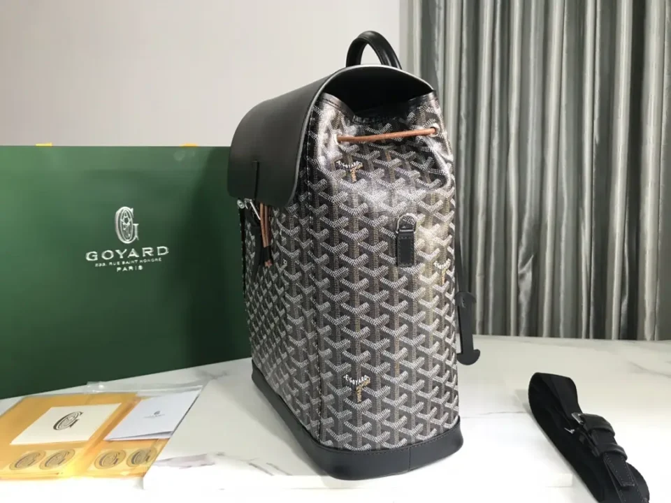 Goyard Saint Louis GM backpack black leather coated canvas with signature chevron pattern and brown drawstring closure