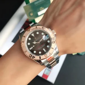 Rolex Yacht-Master black dial rose gold bezel stainless steel watch with two-tone bracelet