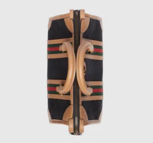 Gucci Exquisite Small Canvas Handbag featuring classic GG canvas, brown leather handles, and red-green striped webbing, showcasing luxury design elements and zipper closure.