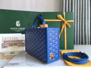 Goyard Saigon PM blue and navy Goyardine canvas tote bag with leather trim and studs