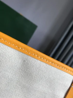 Hermès canvas tote bag white with yellow leather trim detailed stitching made in France