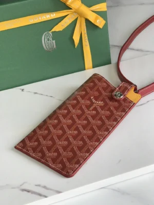 Goyard Phone Holder red patterned coated canvas adjustable strap accessory with metal clasp closure