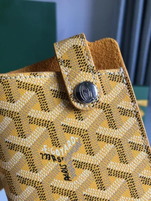 Goyard cardholder yellow leather canvas with silver snap button and signature print pattern