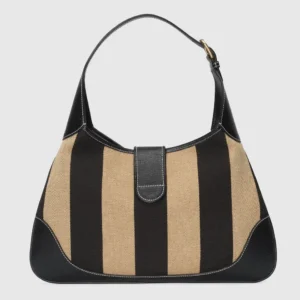 Gucci Cosmogonie Collection Small Handbag in color-blocked canvas with black and beige stripes, featuring soft leather trim and double-G logo, designed for shoulder carry.