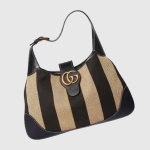 Gucci Cosmogonie Collection Small Handbag featuring a crescent shape, color-blocked canvas design, double-G logo, and gold-toned accessories.
