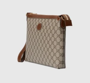 Interlocking Double G Postman Bag in black GG Supreme canvas with brown leather accents, showcasing a stylish design and interlocking double G logo, ideal for luxury accessory enthusiasts.